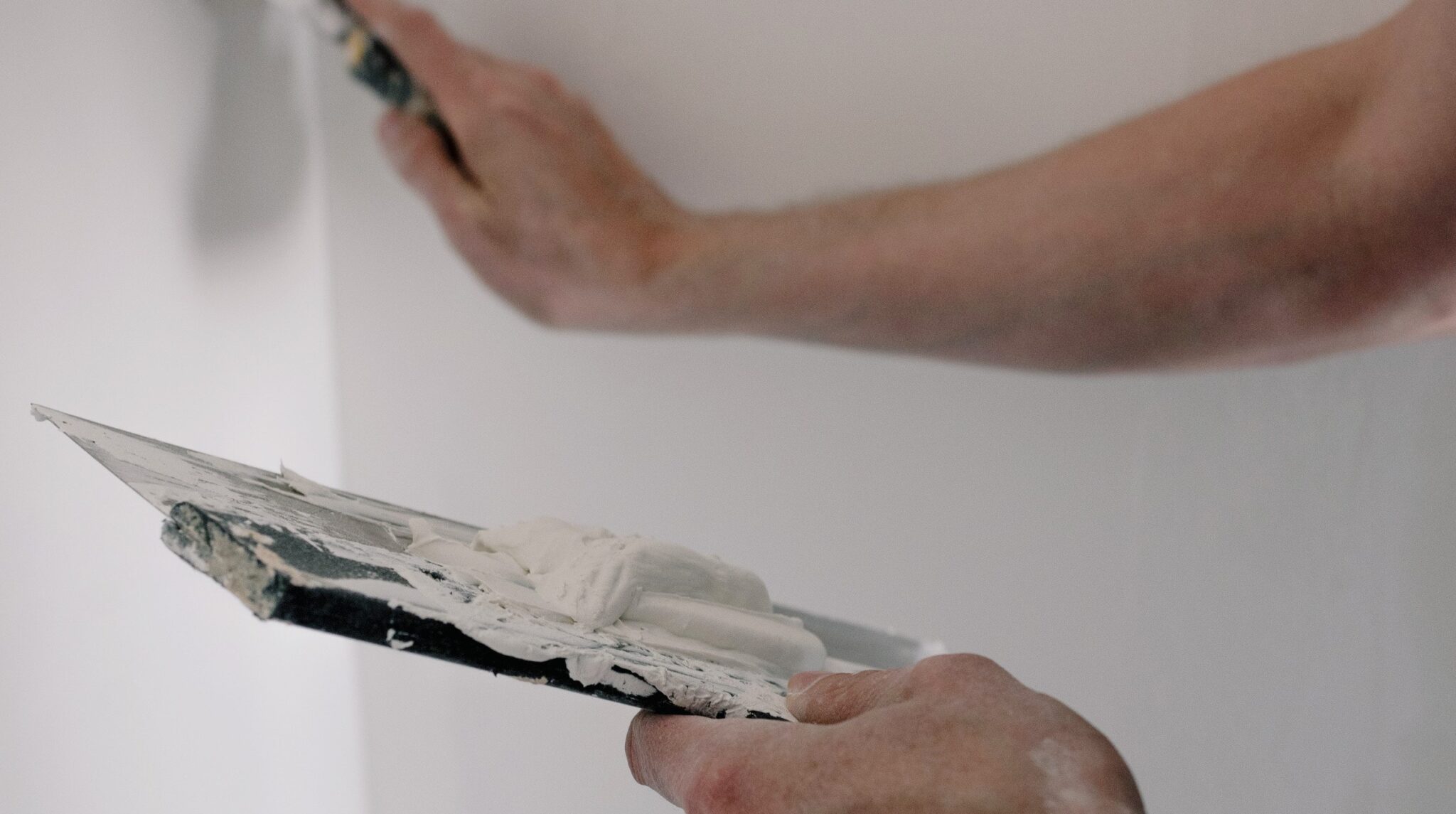 Plastering over artex